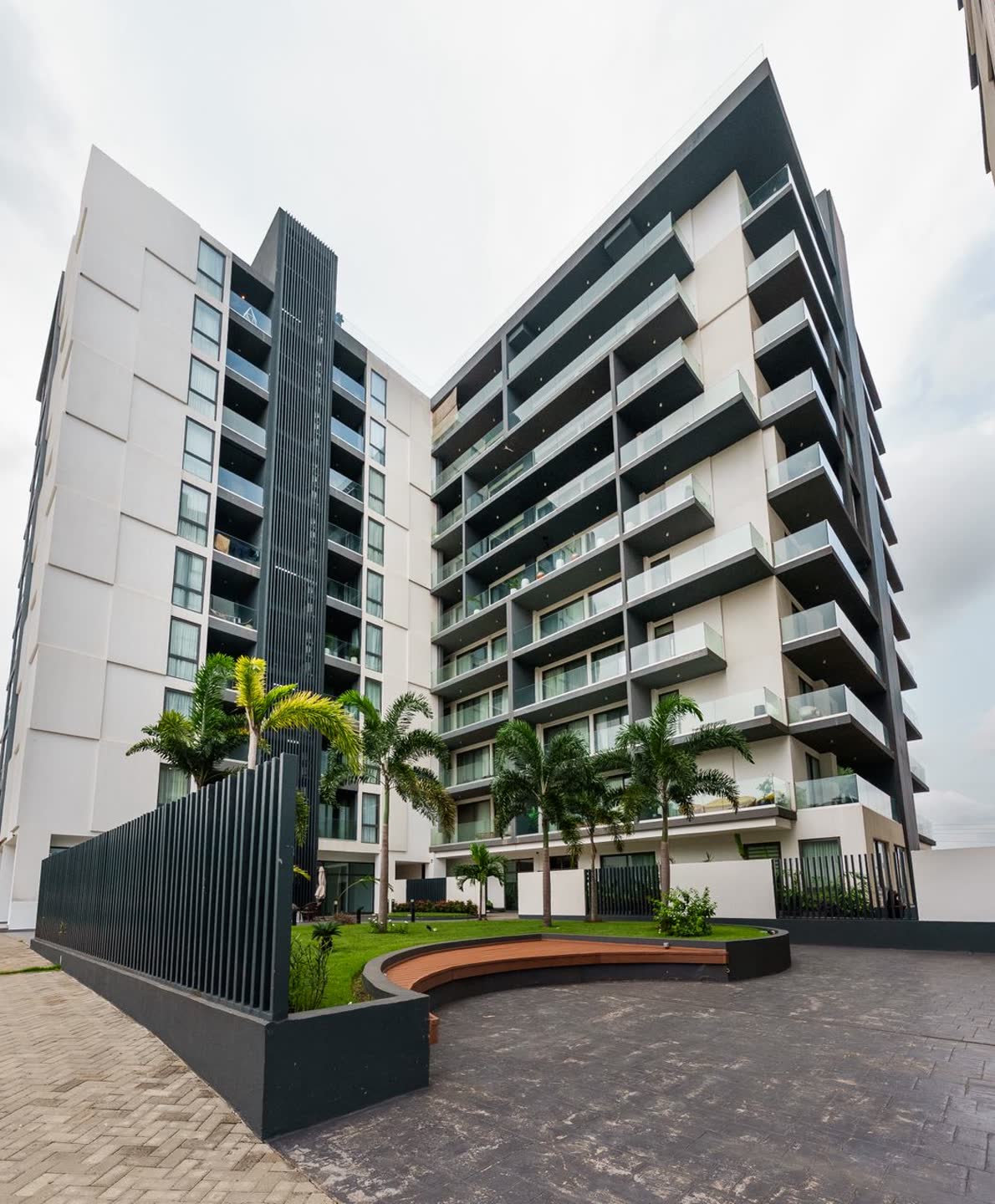 Nova building exterior with balconies and landscaped courtyard, Roman Ridge
