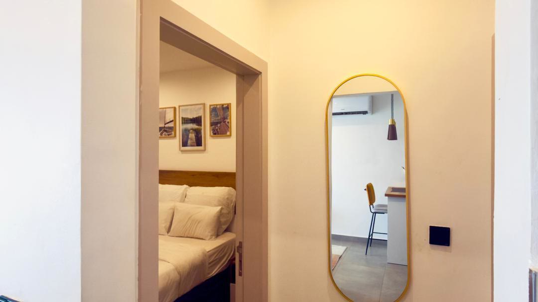 Entry hallway with full-length mirror