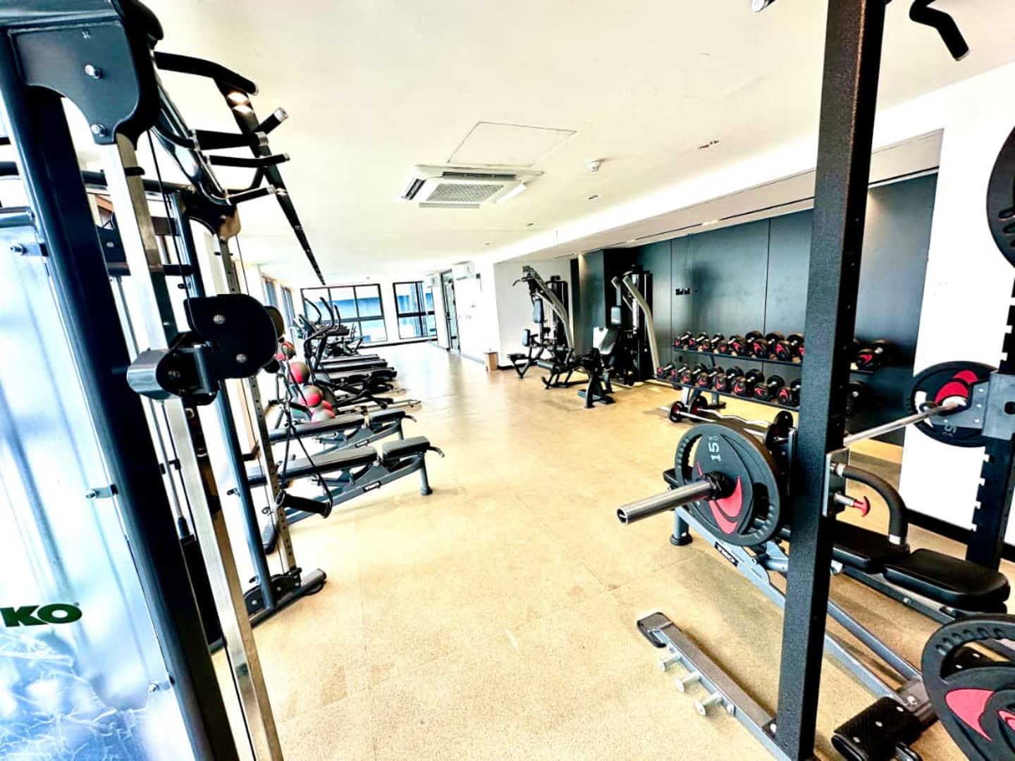 Residents gym with cardio machines and free weights
